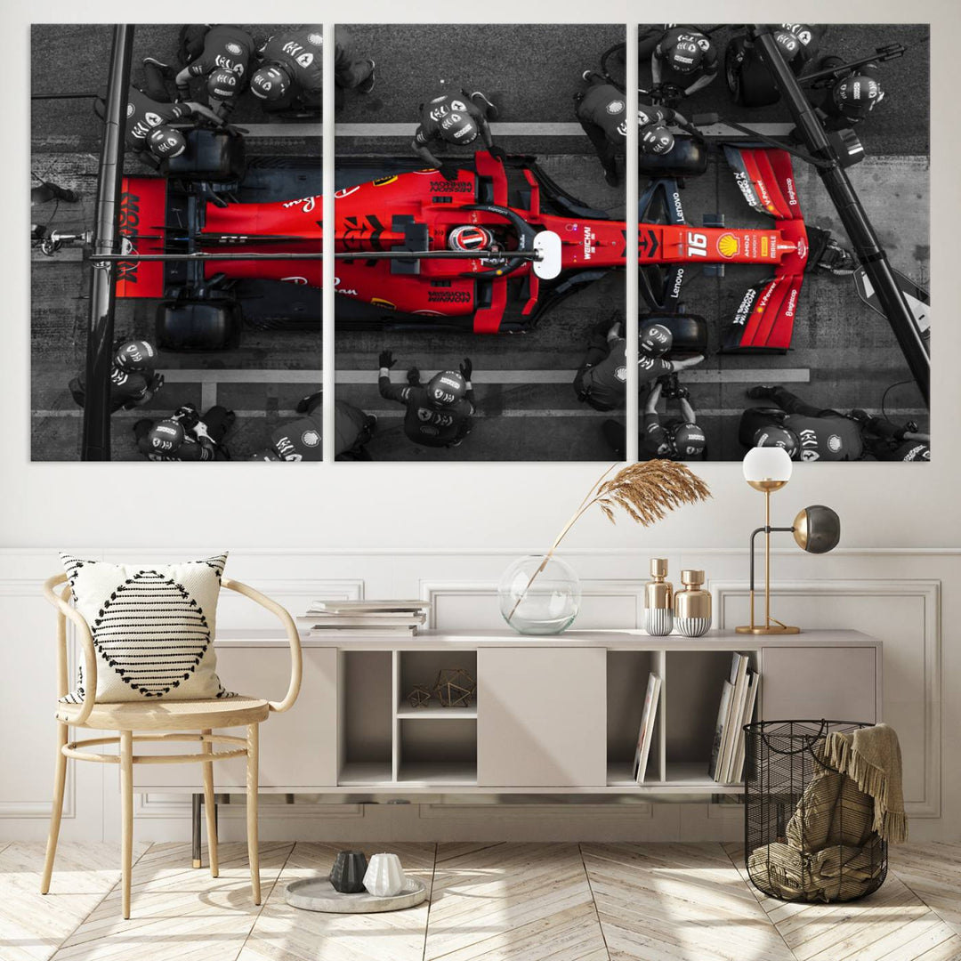 The Ferrari Pit Stop Canvas Wall Art features bold motorsport imagery that captures the precision and speed of Formula 1.