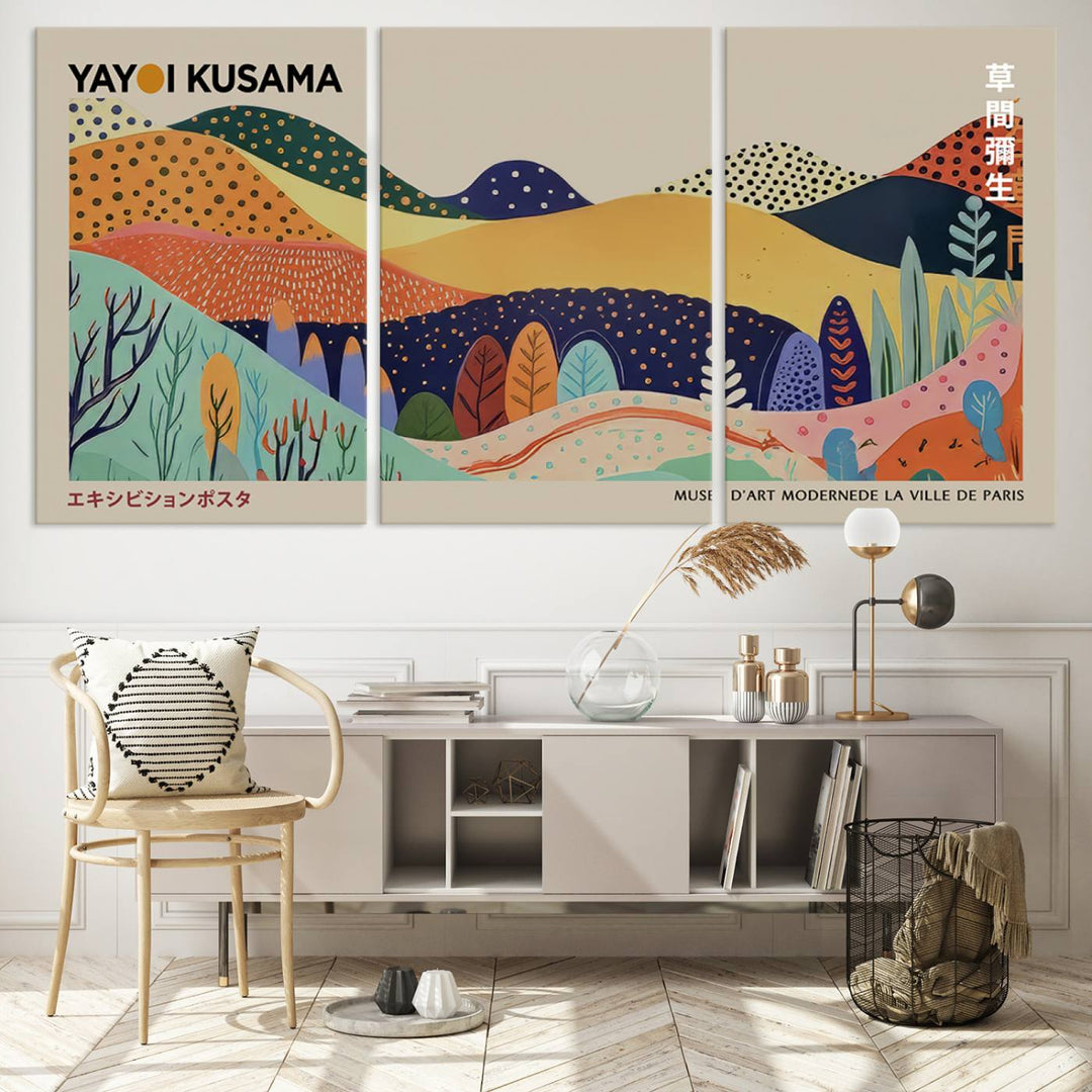 In a living room with contemporary décor, a vibrant abstract landscape by Yayoi Kusama from 1986 is prominently displayed.