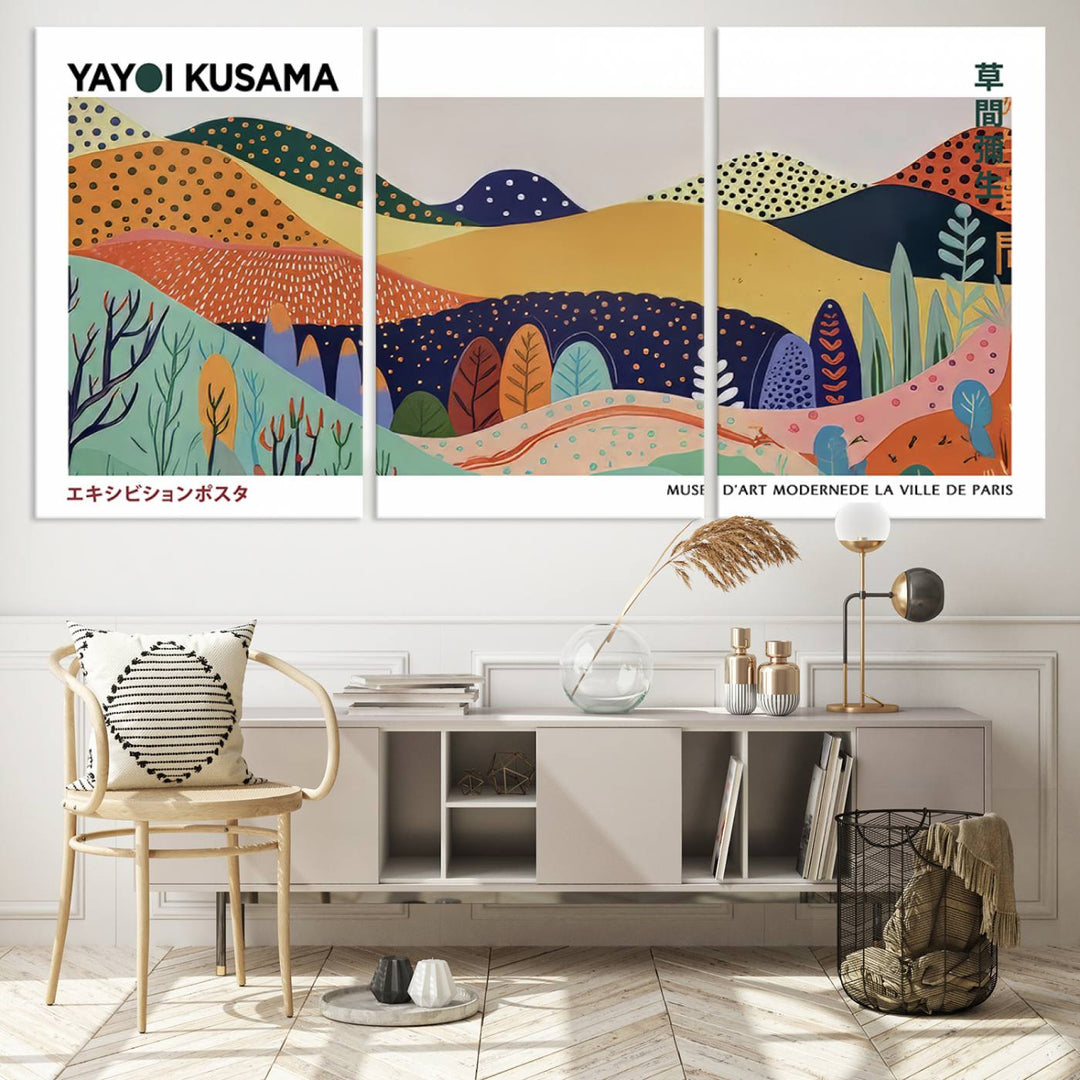 A triptych featuring the Framed Yayoi Kusama 1986 Wall Art Print hangs above. This Japanese Wabi Sabi inspired piece, rich in vibrant abstract landscapes, adds an elegant touch to any nature-inspired décor.