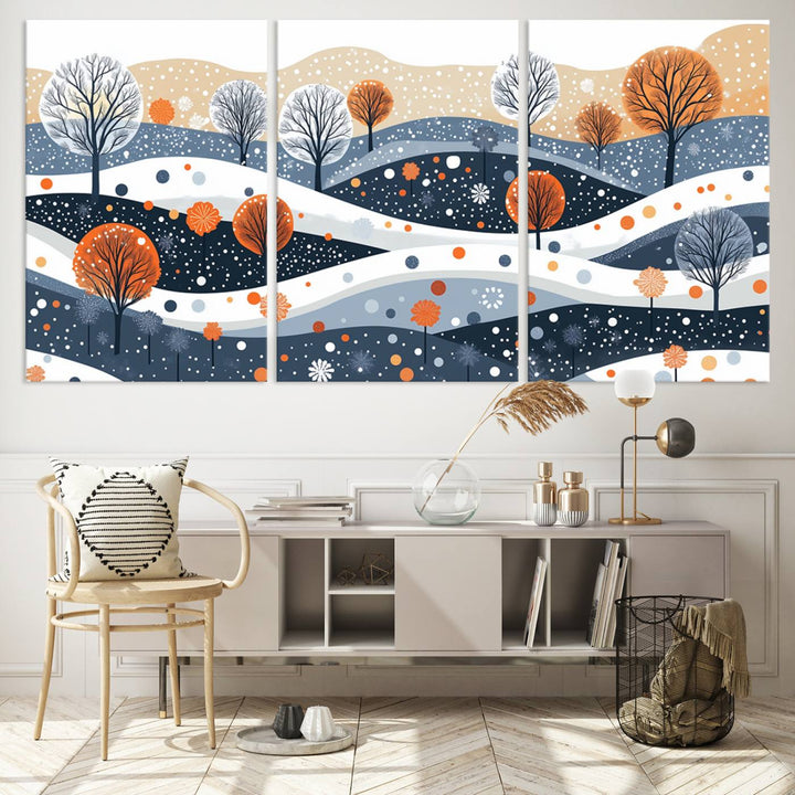 The "Abstract Winter Landscape Canvas Wall Art Print," featuring a triptych of landscapes with trees and hills in vibrant orange, white, and blue hues, adds a gallery-quality finish that transforms the space into an art lover's dream.