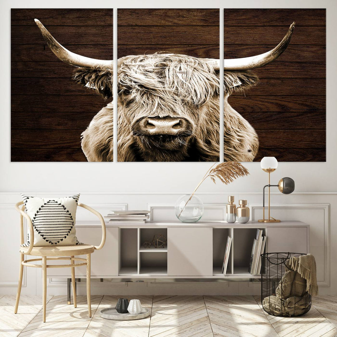 Highland Cow Wall Art Canvas Print: Majestic Scottish bull on rustic decor, ready to hang.