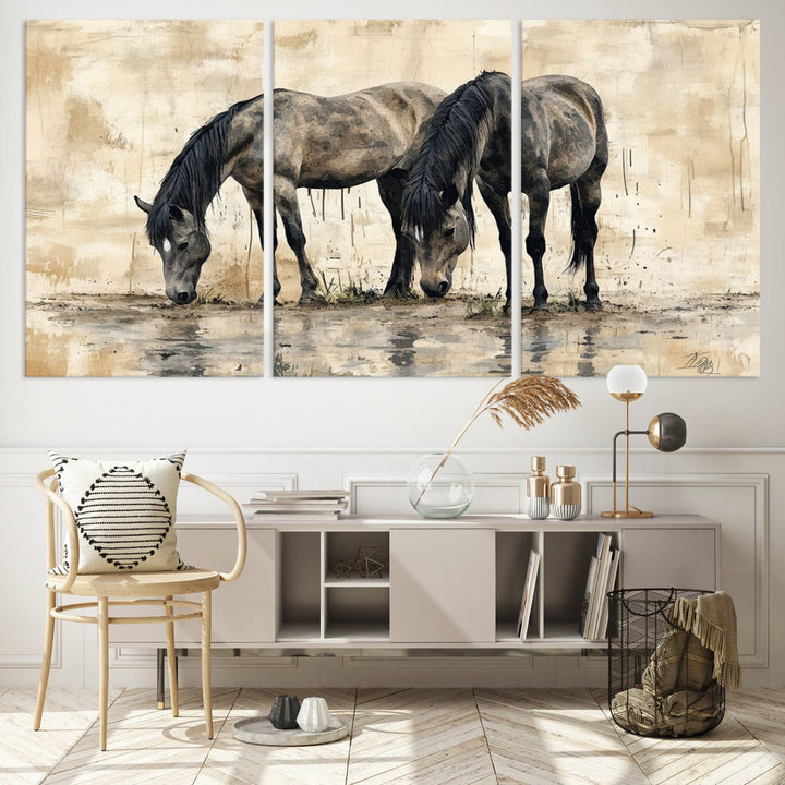 Chines Ink Style Black Horses Wall Art Canvas Print features a triptych painting of two horses drinking at the water's edge.