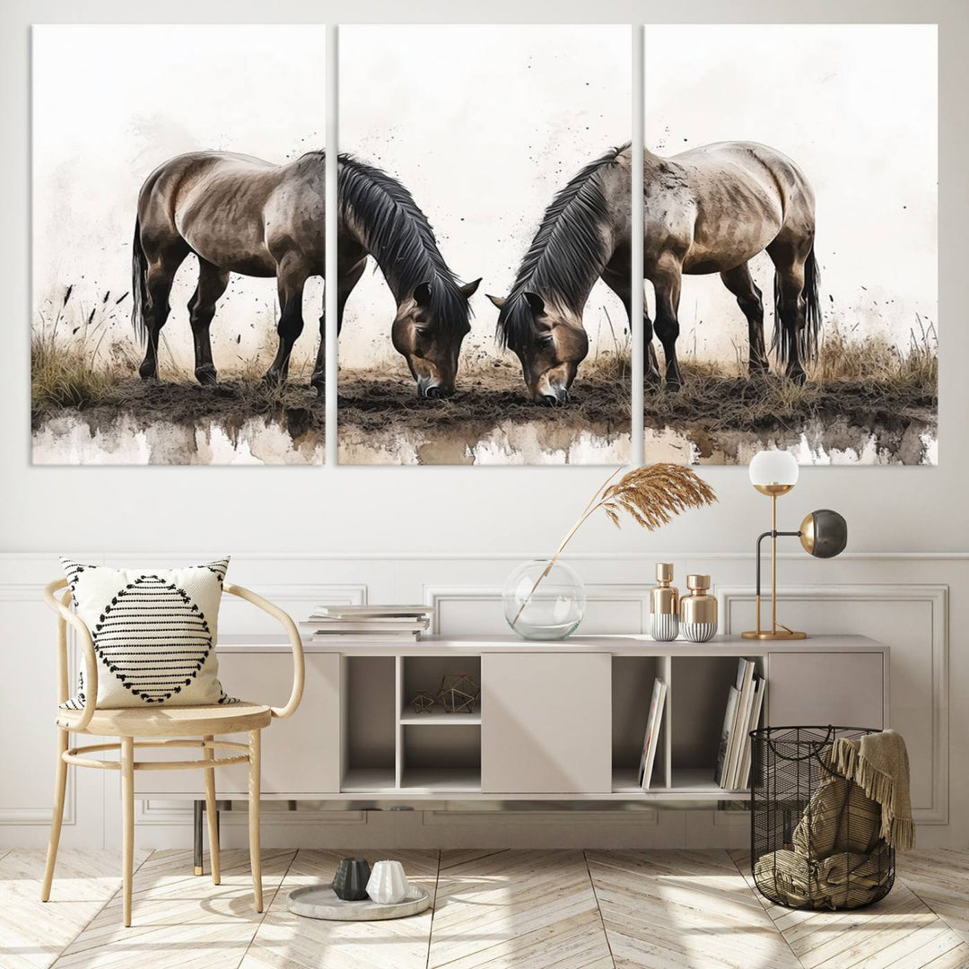 A Chinese Ink Style Horses Wall Art Canvas Print featuring two horses grazing is displayed in a modern setting.