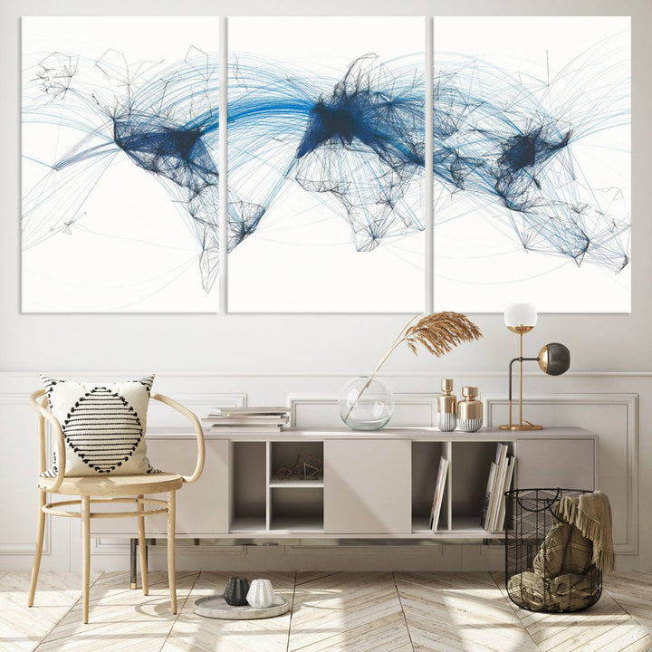 The Aviation Flight Map Wall Art is a set of three abstract panels featuring a world map with blue lines, resembling a flight map. Ideal for aviation enthusiasts, this ready-to-hang framed air traffic art print enhances the appeal of modern decor.