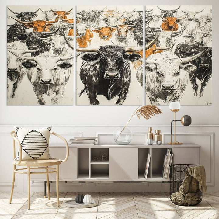 This exquisite farmhouse wall art, titled "Western Longhorn Cattle Canvas Print," showcases a majestic herd of longhorn cattle in a three-panel design. This ready-to-hang and framed barn decor infuses your space with rustic charm.