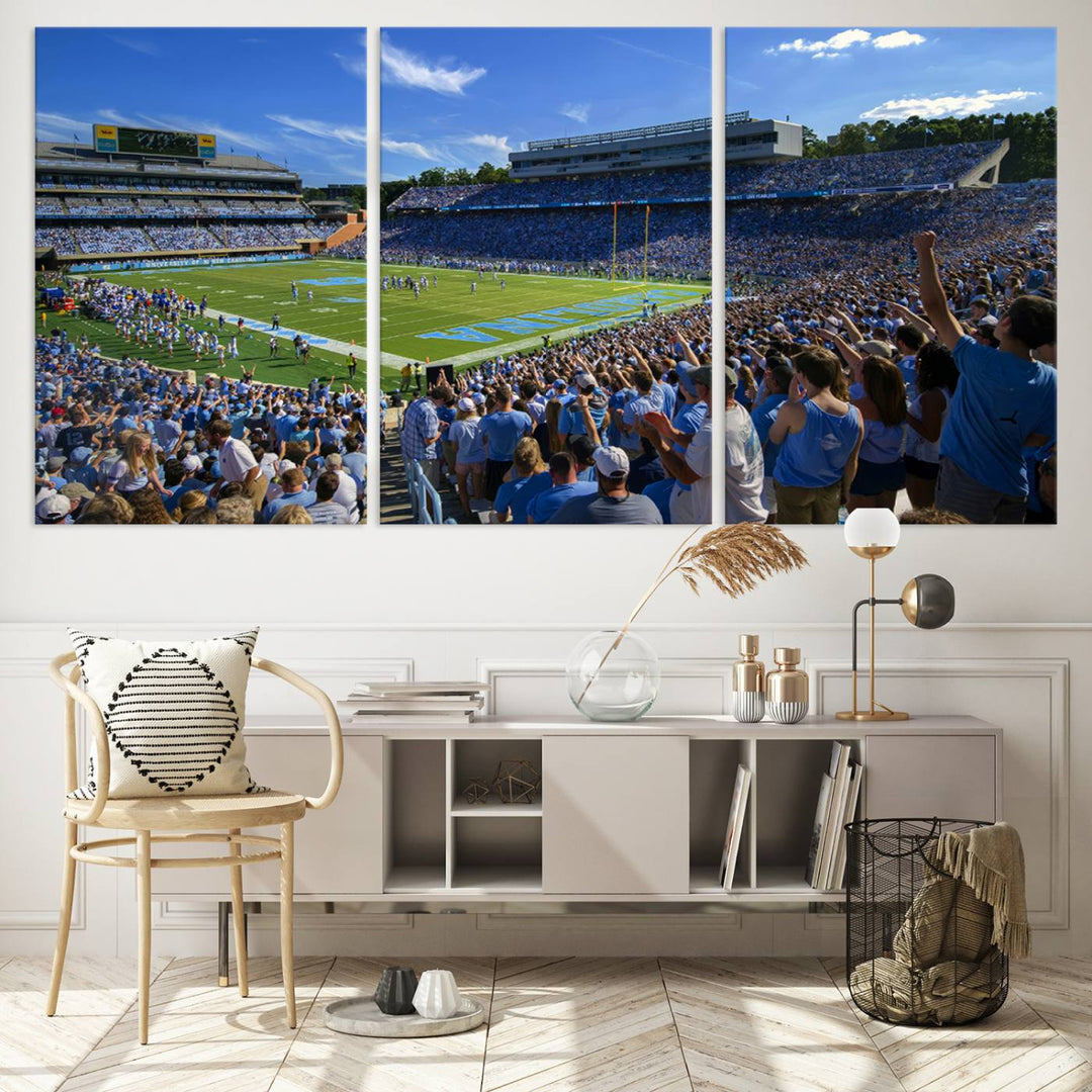 A gallery-quality canvas wall art print featuring the University of North Carolina Tar Heels Football Team and Chapel Hill's Kenan Memorial Stadium adorns the cafe wall.