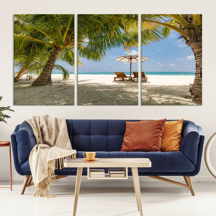 The canvas art print titled Lounge Chairs Palm Trees on Tropical Beach offers free shipping.