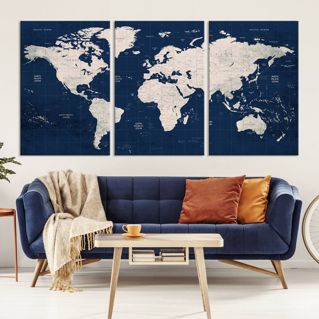 Large modern world map wall art canvas print in beige and navy; showcases a 3-panel vintage map design and is ready to hang.