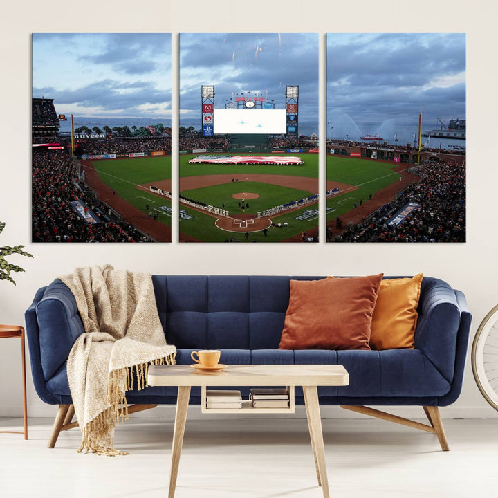 This framed 3-panel canvas MLB wall art features a giant flag and fans under a cloudy sky at Oracle Park.