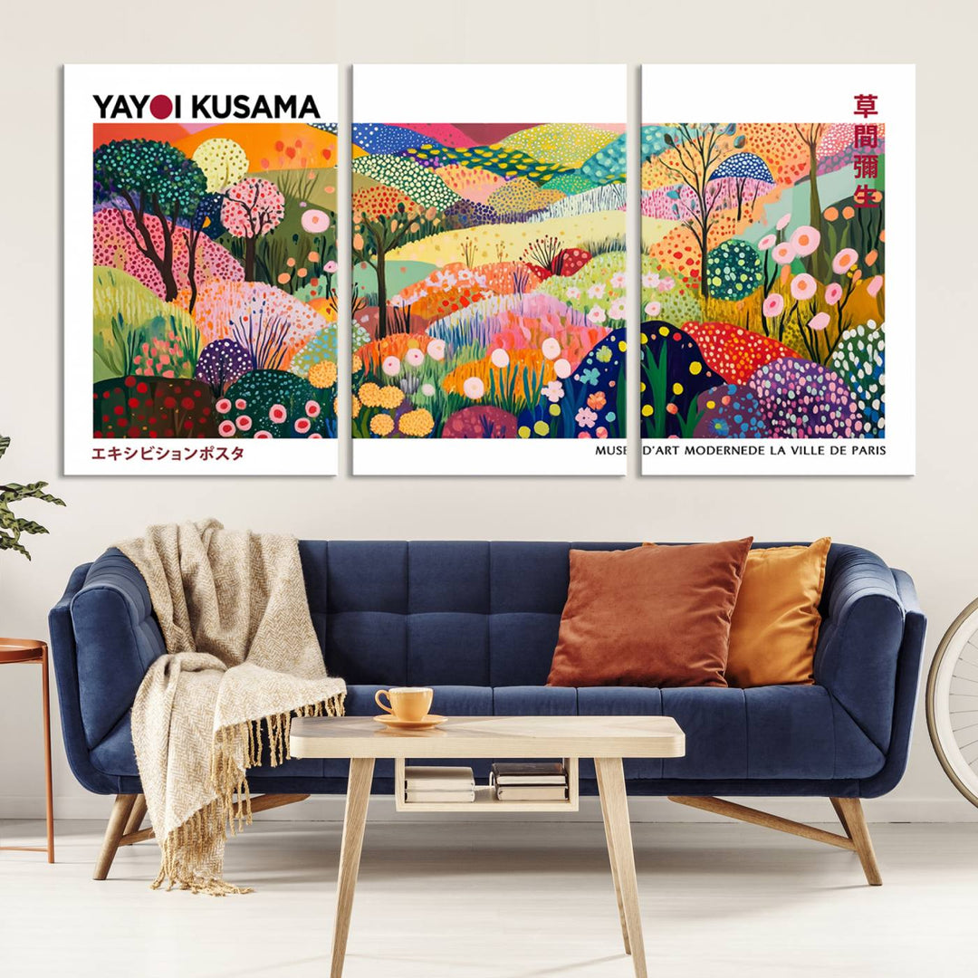 Three vibrant, abstract Yayoi Kusama wall art prints adorn a black wall, creating a perfect blend of contemporary décor.