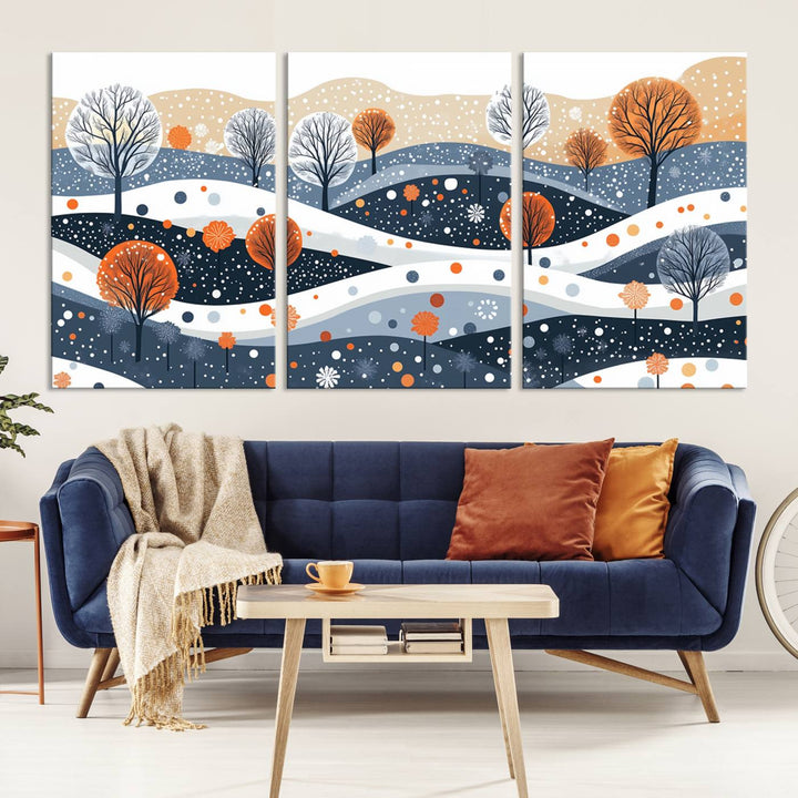 The "Abstract Winter Landscape Canvas Wall Art Print," featuring a triptych of landscapes with trees and hills in vibrant orange, white, and blue hues, adds a gallery-quality finish that transforms the space into an art lover's dream.