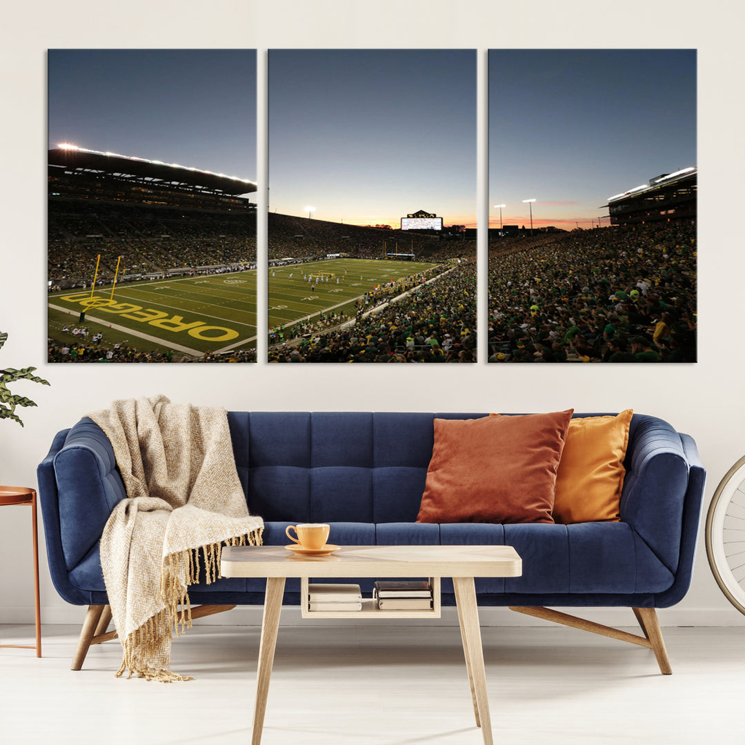 Canvas artwork depicting an Oregon Ducks football game at Autzen Stadium, capturing a sunset and packed stands.