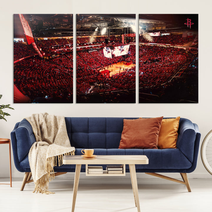 A crowded basketball arena with red lighting hosts a Houston Rockets game.