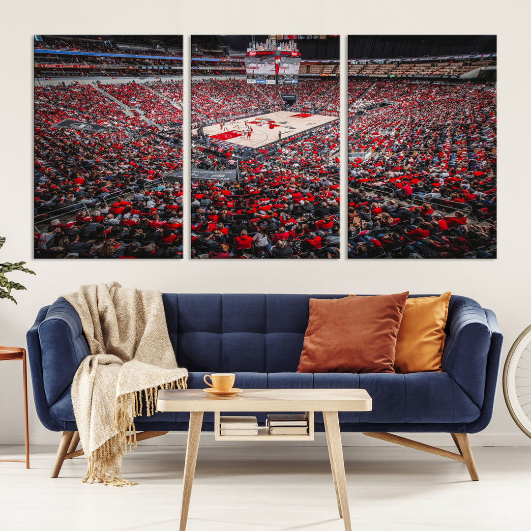 A painting of Louisville Cardinals fans in red at the KFC Yum Center Arena.