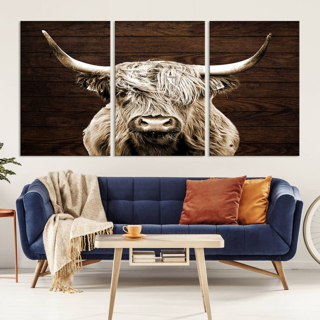 Highland Cow Wall Art Canvas Print: Majestic Scottish bull on rustic decor, ready to hang.