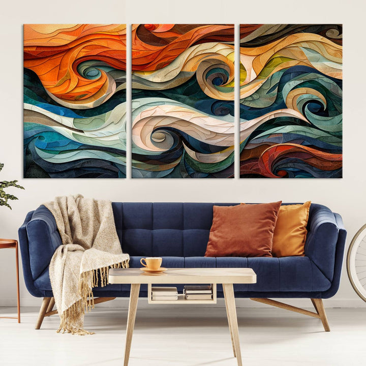 Abstract Wave Wall Art is a ready-to-hang framed canvas print featuring swirling orange, blue, and white patterns. It's perfect for adding vibrant decor to modern spaces.