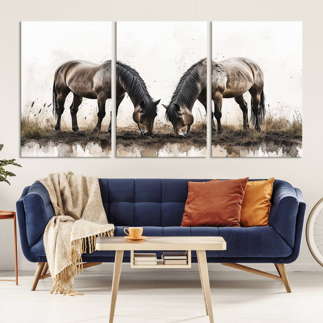 A Chinese Ink Style Horses Wall Art Canvas Print featuring two horses grazing is displayed in a modern setting.