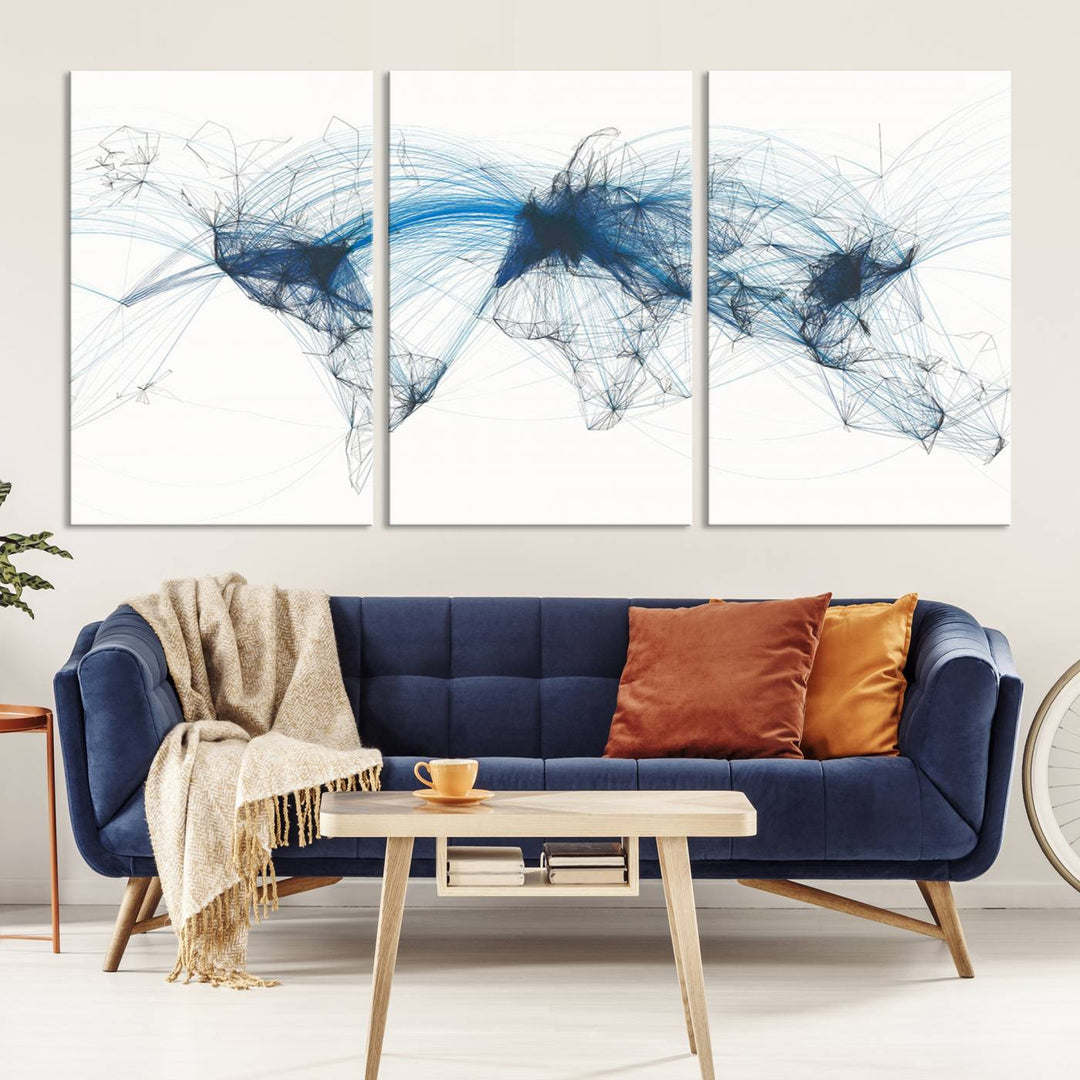 The Aviation Flight Map Wall Art is a set of three abstract panels featuring a world map with blue lines, resembling a flight map. Ideal for aviation enthusiasts, this ready-to-hang framed air traffic art print enhances the appeal of modern decor.