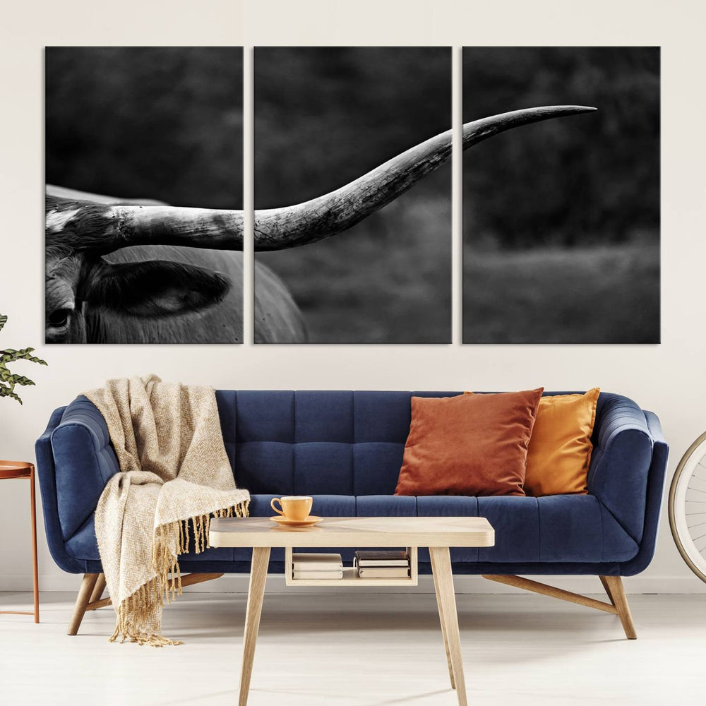 Cow Longhorn Wall Art: This black and white print adds rustic charm.