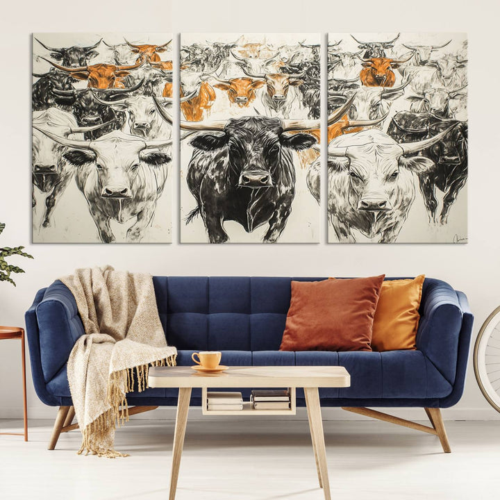 This exquisite farmhouse wall art, titled "Western Longhorn Cattle Canvas Print," showcases a majestic herd of longhorn cattle in a three-panel design. This ready-to-hang and framed barn decor infuses your space with rustic charm.