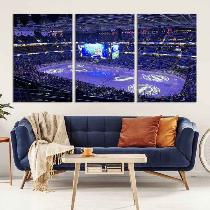 The wall art canvas print at Amalie Arena features team logos on ice, encapsulating the vibrant atmosphere of an NHL hockey stadium.