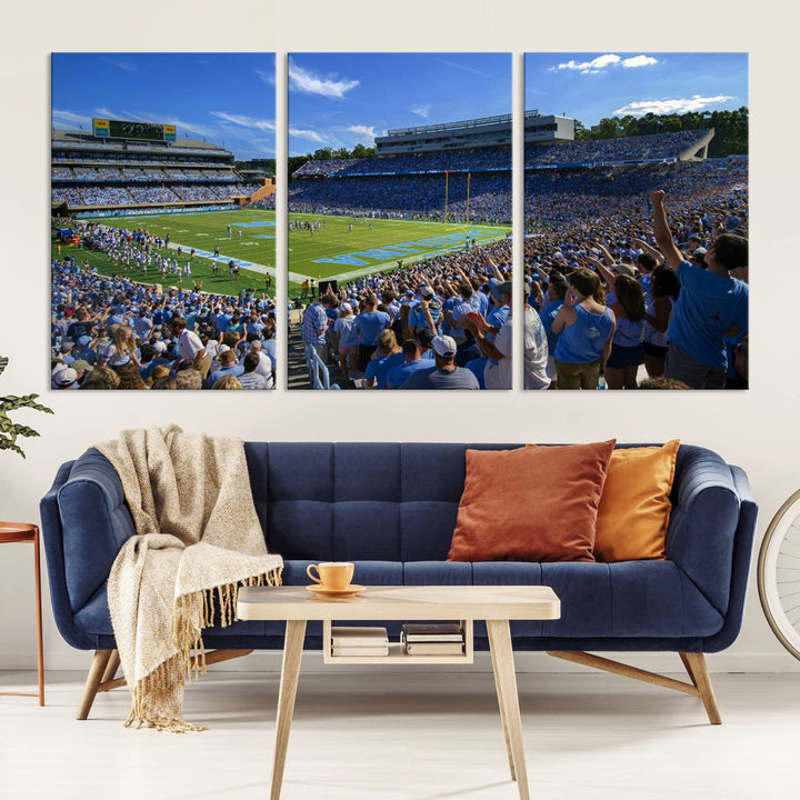 A gallery-quality canvas wall art print featuring the University of North Carolina Tar Heels Football Team and Chapel Hill's Kenan Memorial Stadium adorns the cafe wall.