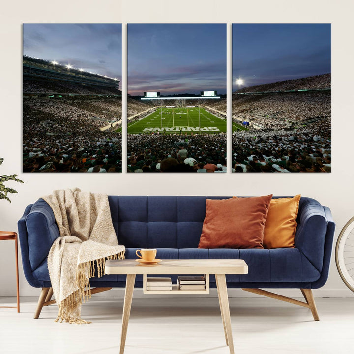 Wall art featuring a stadium at dusk with full stands—ideal for the Michigan State Spartans Football Team Canvas Print.