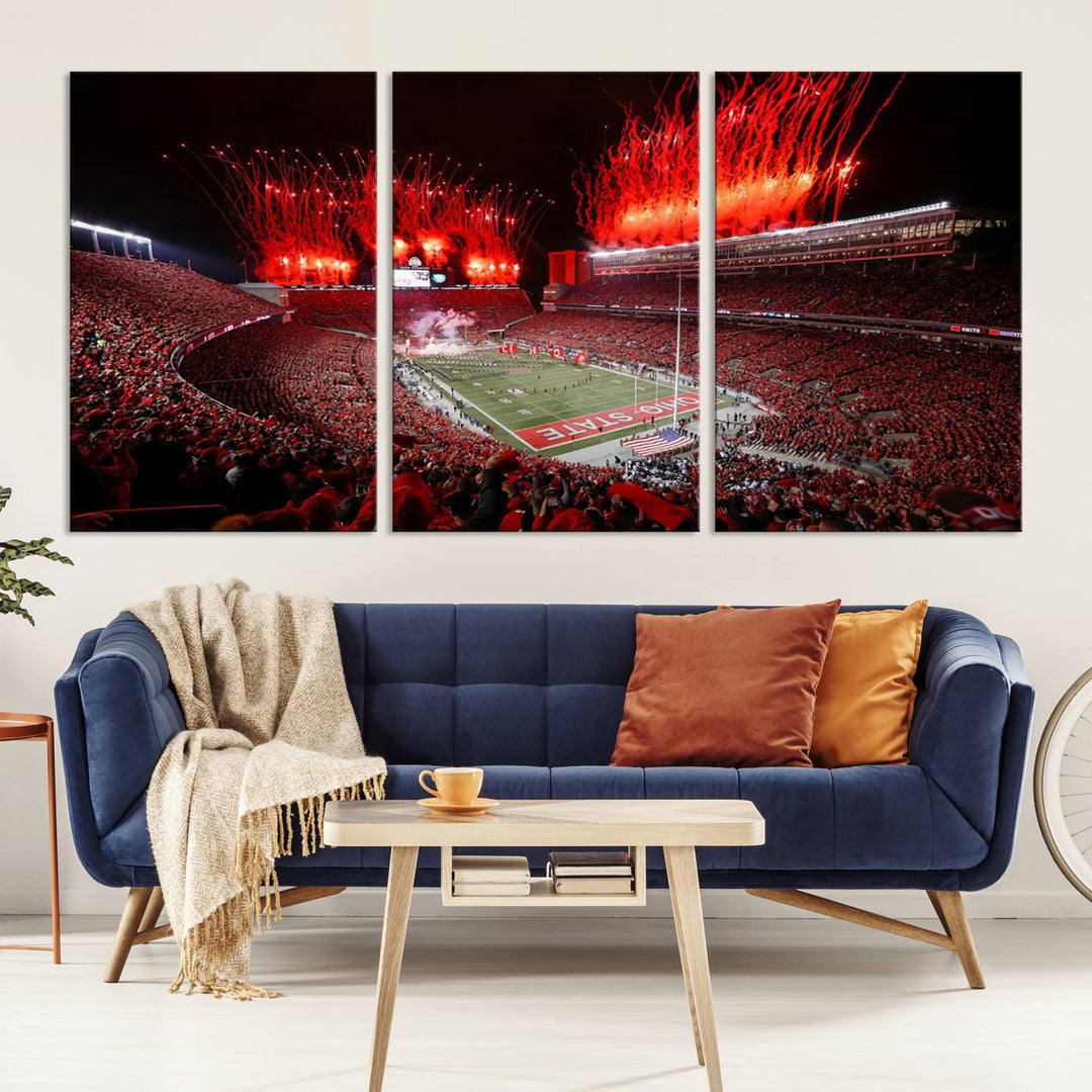 A vibrant red canvas art of a packed Ohio State Buckeyes stadium at night with fireworks.