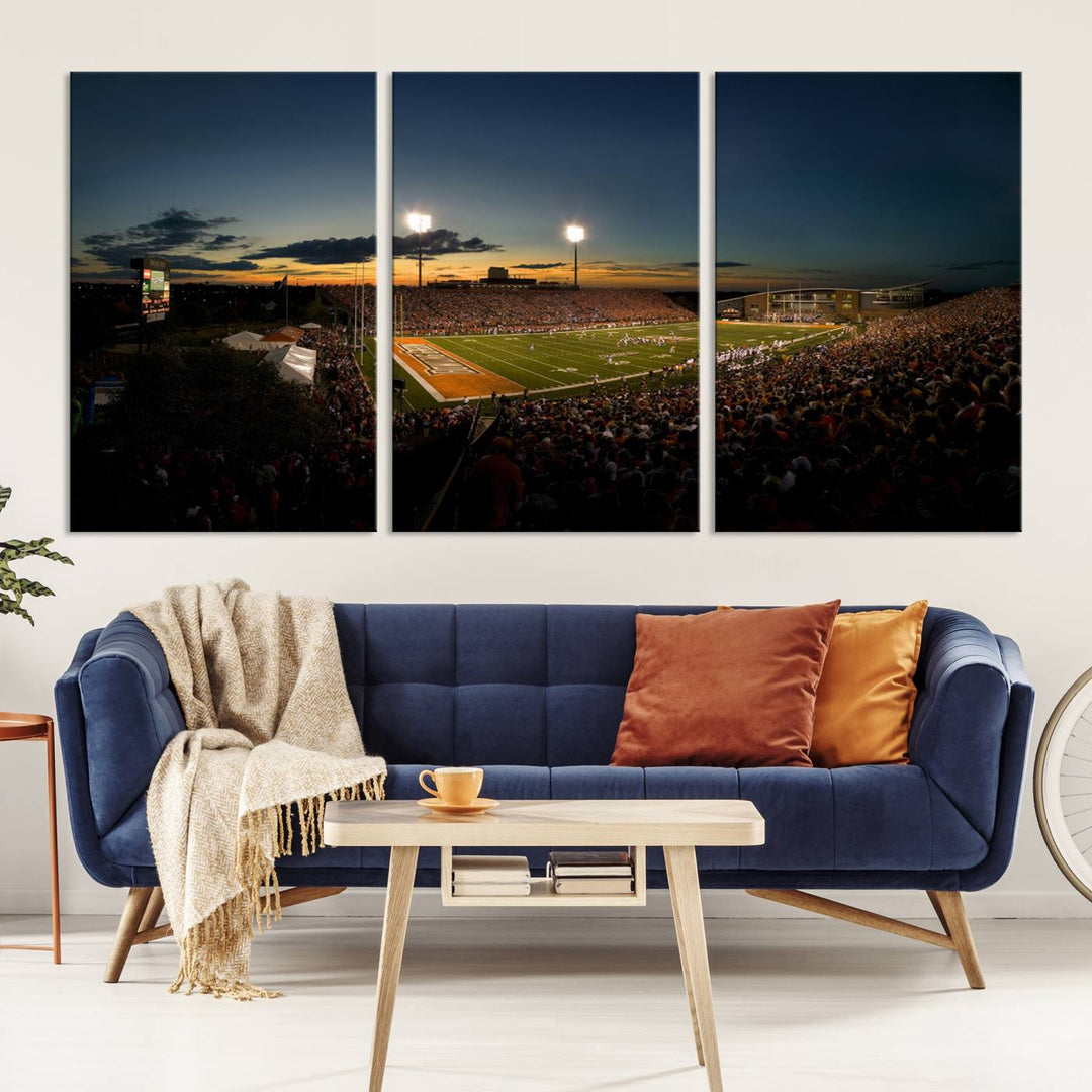 Ball State Cardinals Football Team Print - Muncie Scheumann Stadium Canvas featuring a sunset, floodlights, and lively crowd.