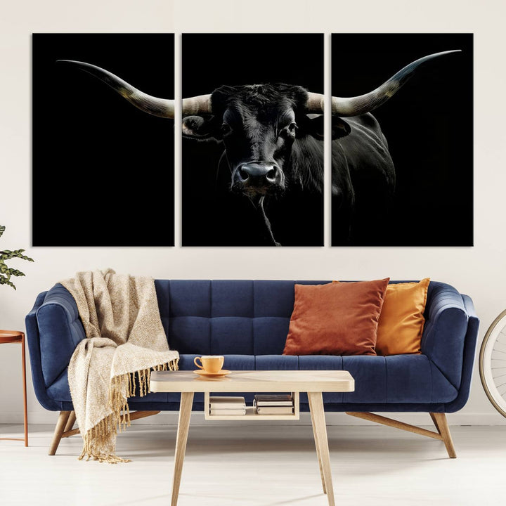 The Texas Black Longhorn Bull Canvas Print, featuring large curved horns set against a dark background, is ideal for Western decor.