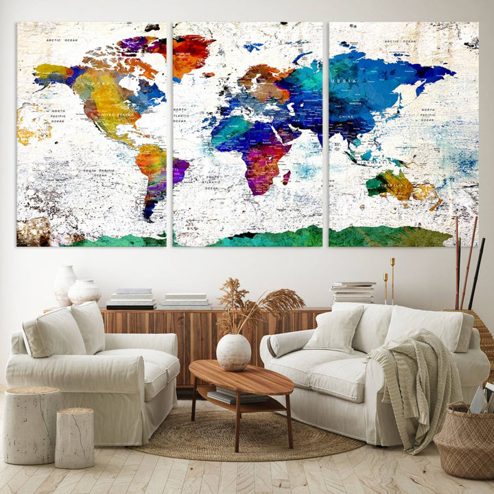 The wall art features the Colorful Abstract World Map – a vibrant contemporary triptych map print.