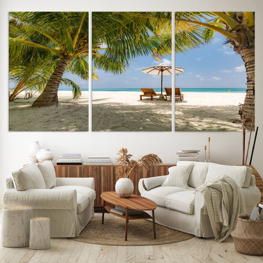 The canvas art print titled Lounge Chairs Palm Trees on Tropical Beach offers free shipping.