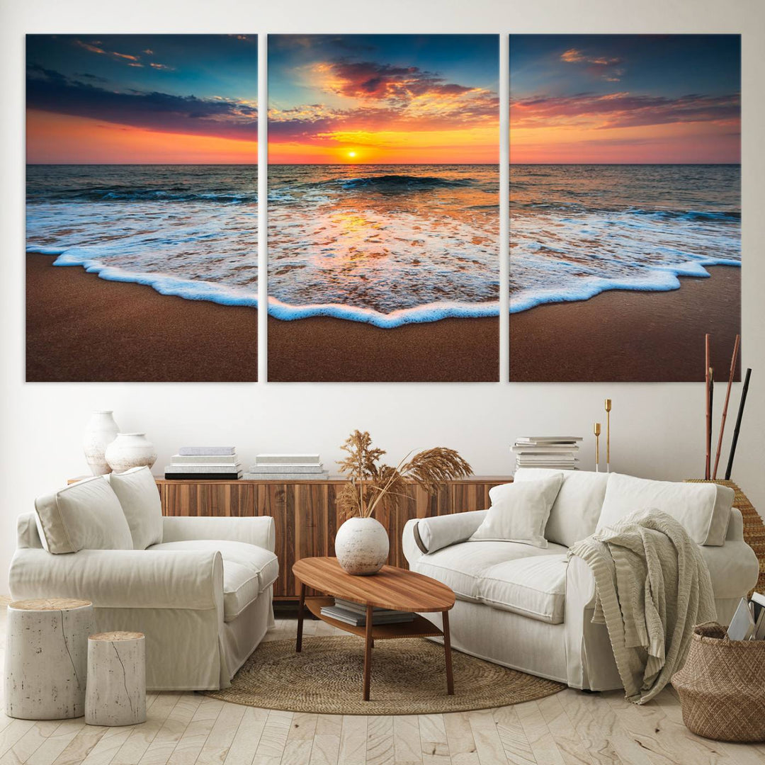 A Sunset with Calm Waves on the Beach Wall Art Canvas Print adorns the dining room.