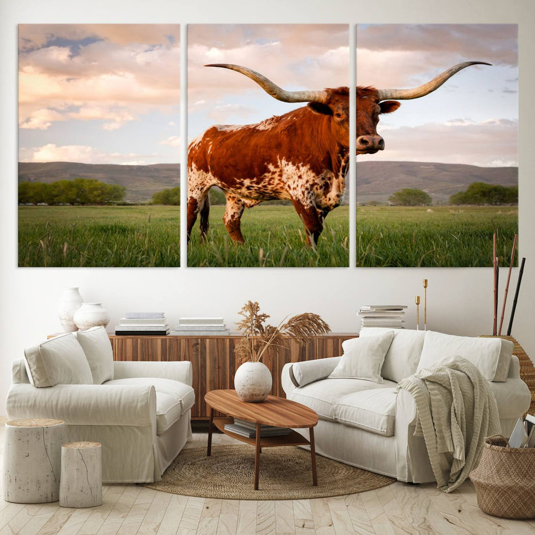 The Texas Cow Canvas Wall Art print captures a longhorn cow at sunset and is ready to hang.