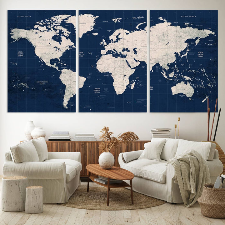 Large modern world map wall art canvas print in beige and navy; showcases a 3-panel vintage map design and is ready to hang.