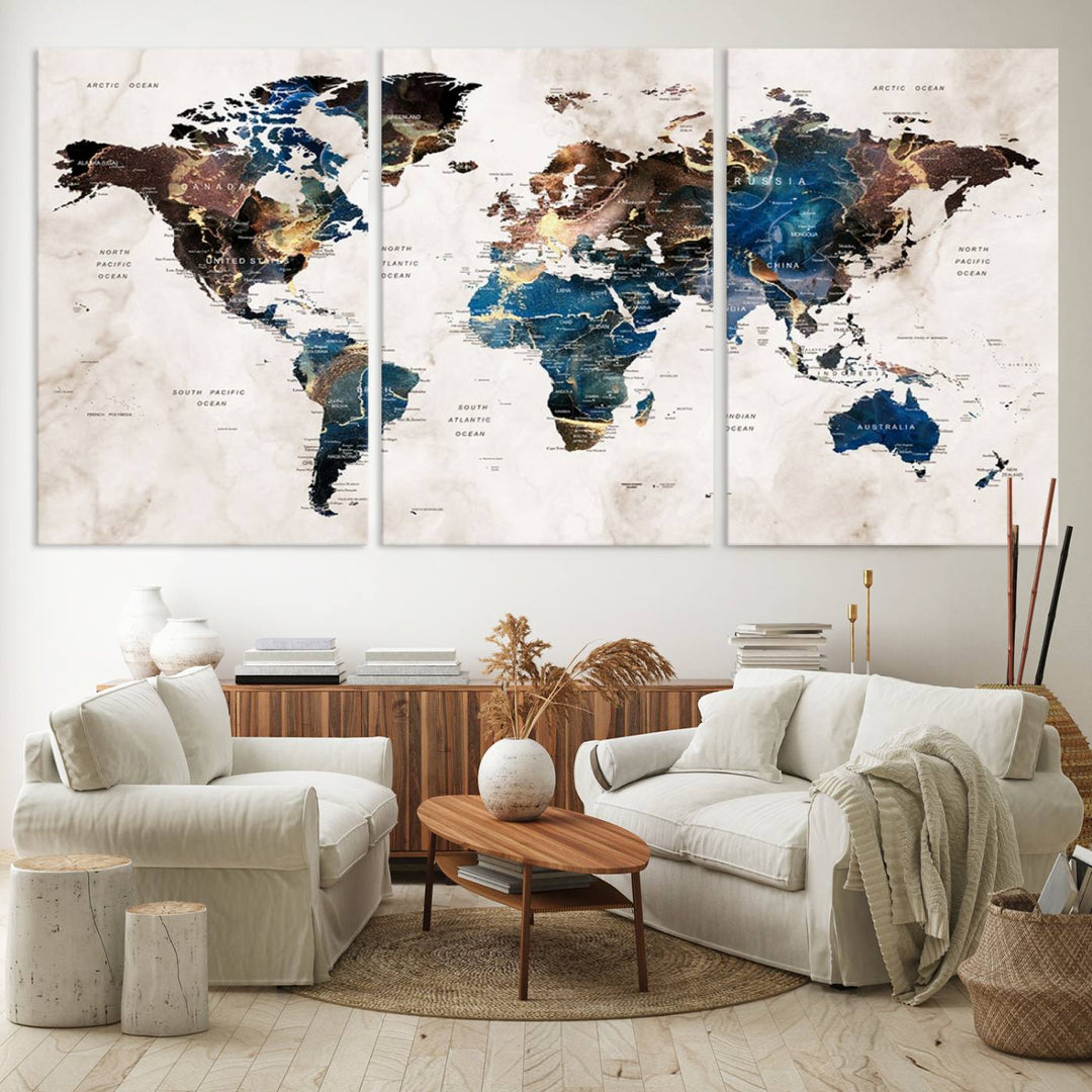 Abstract earth-toned 3-panel world map wall art featuring blues and browns, ready to hang; it showcases continents on modern canvas.