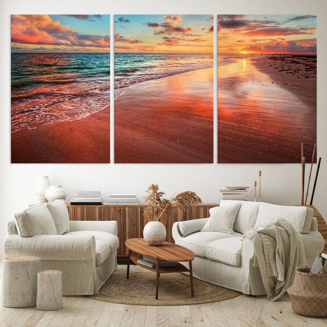 A Vibrant Sunset Beach Canvas Print with ocean waves and sandy shoreline enhances coastal-themed interiors.