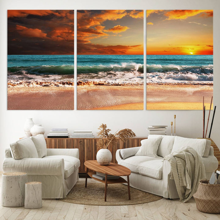 A Golden Sunset Beach triptych seascape canvas hangs on the wall.