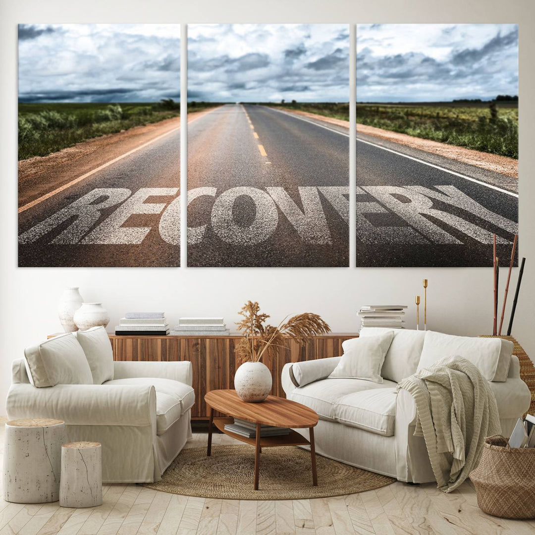 The Recovery Road Wall Art Canvas Print depicts a road under a cloudy horizon.