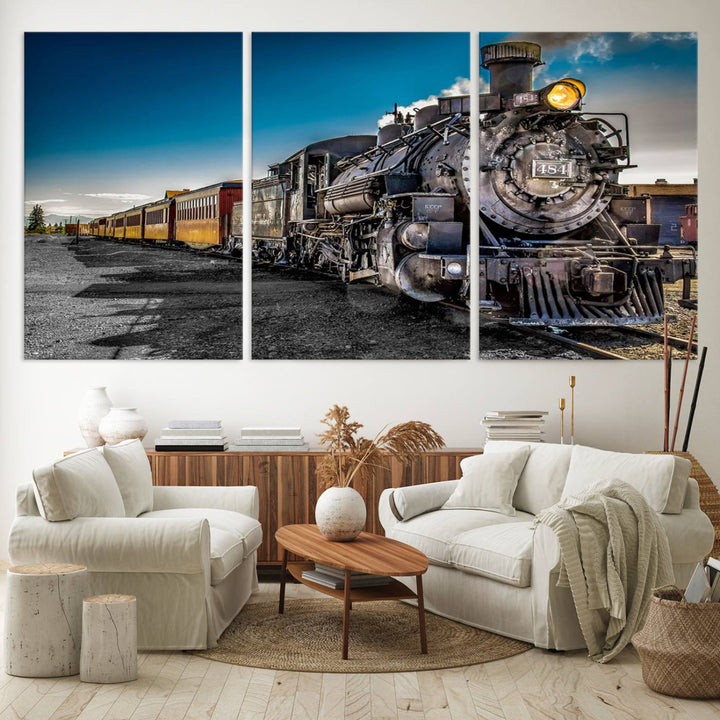 The Train Wall Art Canvas Print features a vintage steam train with a bright headlight.