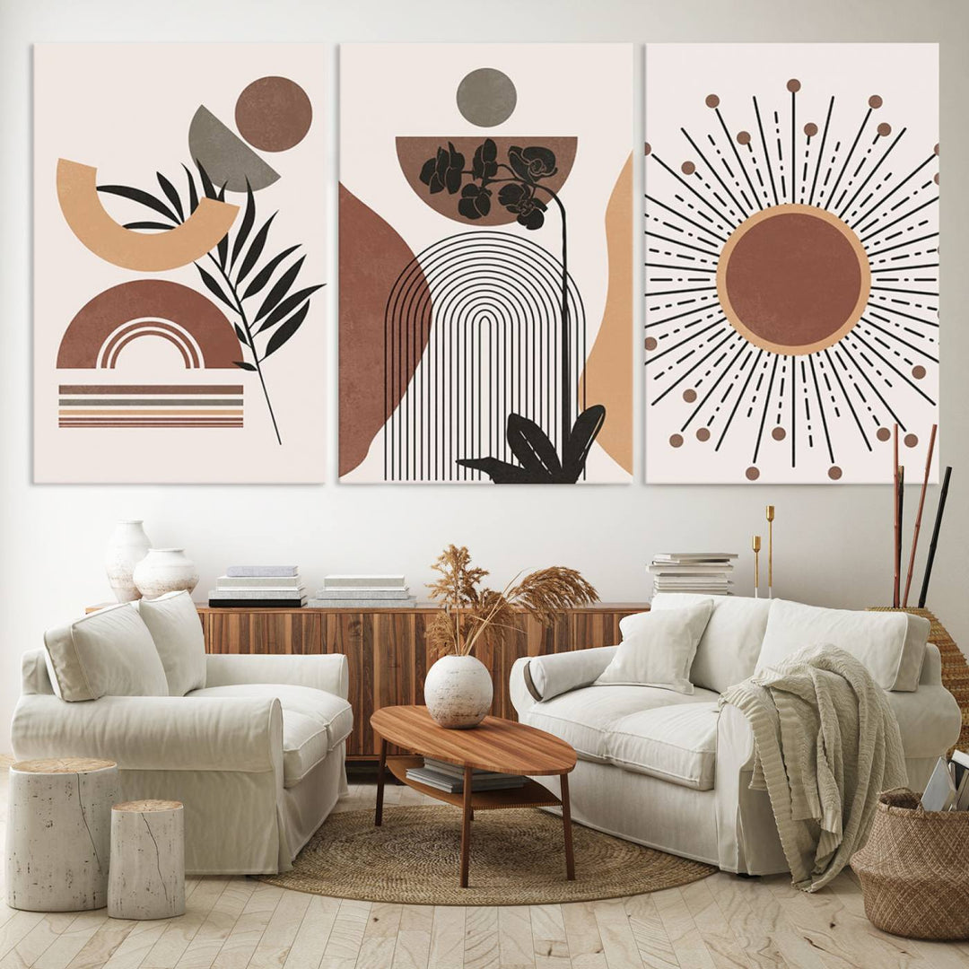 A trio of Boho Wall Art Canvas Print Sets, showcasing mid-century and bohemian styles on museum-quality canvas, adorn the wall.