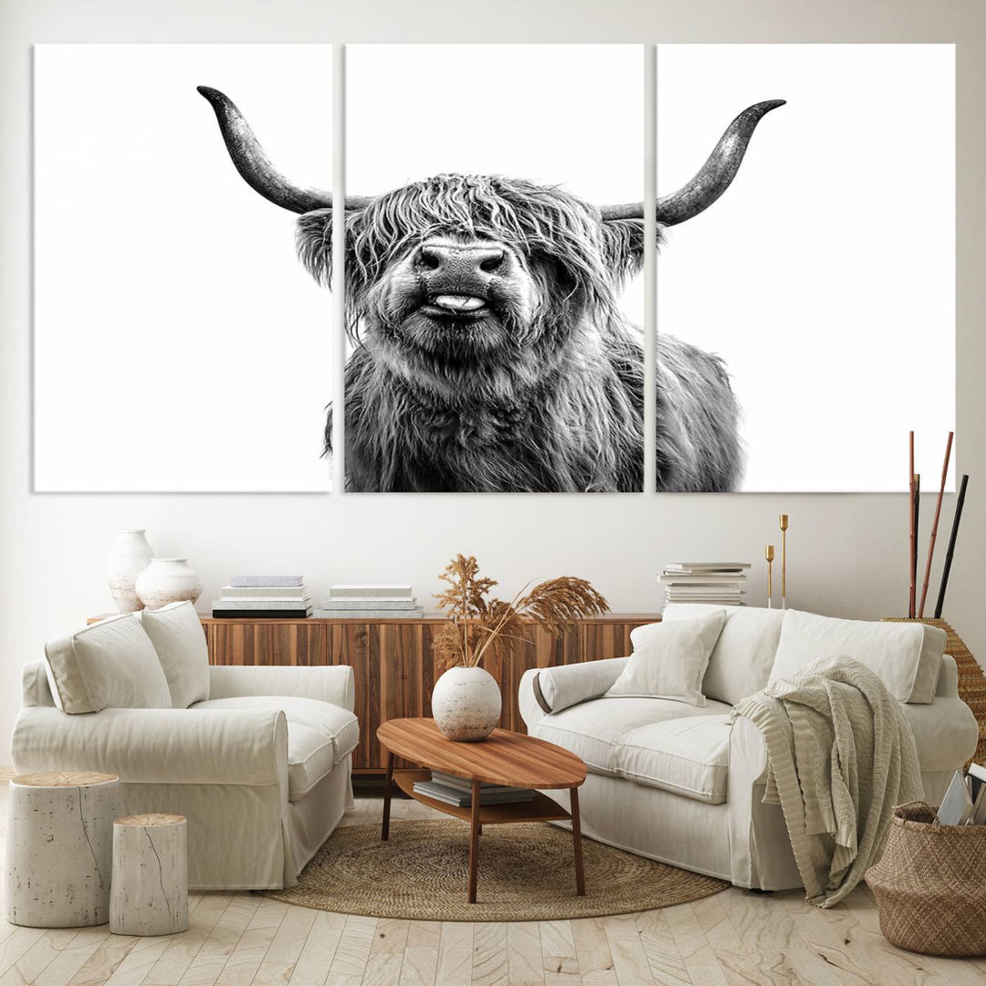 The Fanny Highland Cow art print decorates the modern kitchen, featured in black and white.