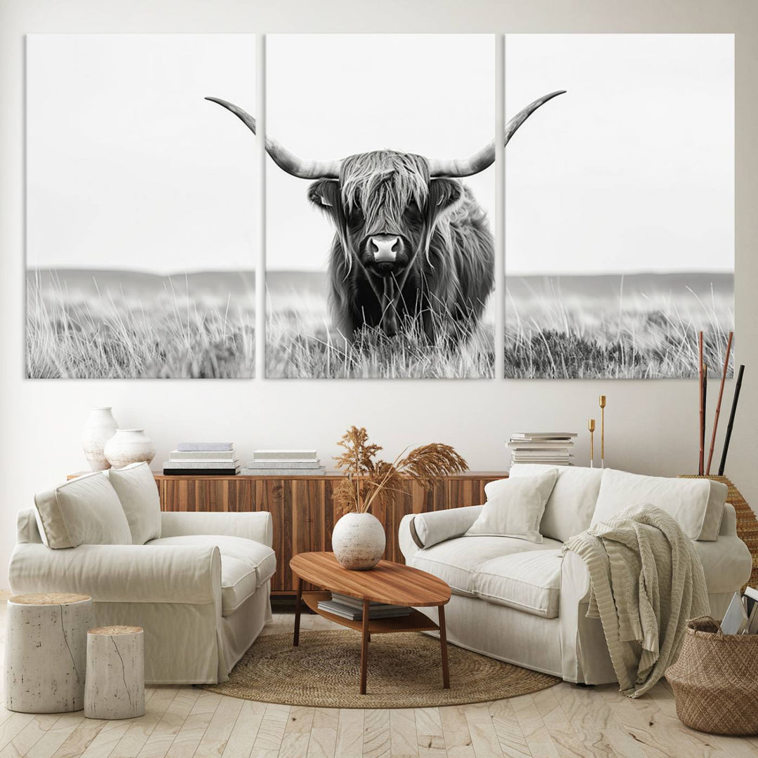 The Majestic Beauty canvas of a Highland cow adds elegance to the white walls as it hangs prominently.