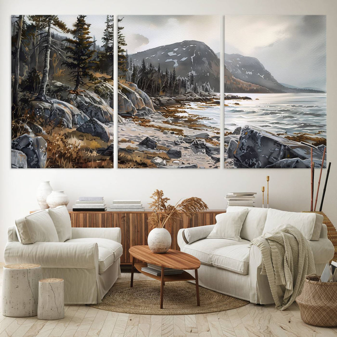 Framed wall art depicting Acadia National Parks rocky coast, trees, mountains, and sunlight over the sea; ready to hang.