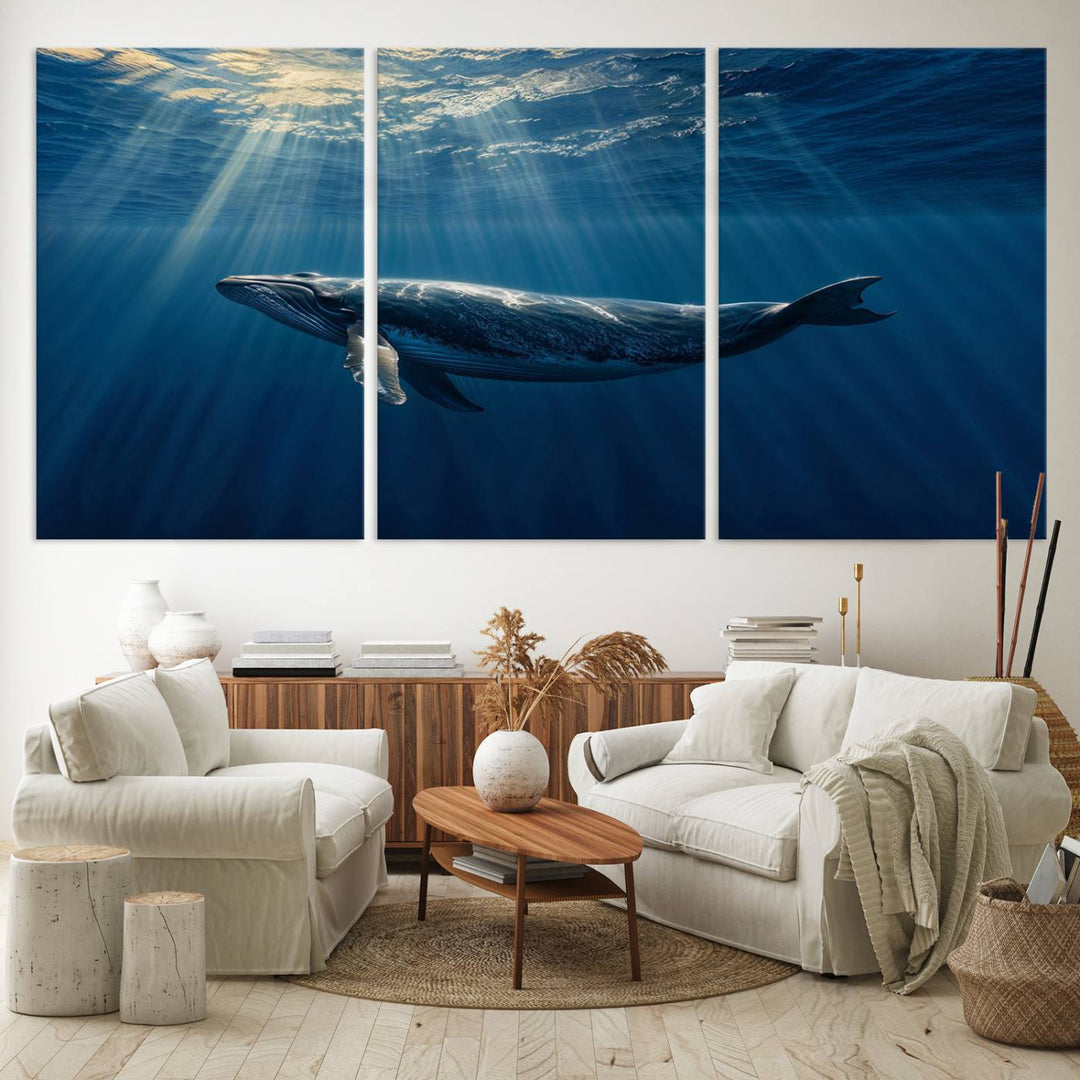 The Whale under Ocean wall art canvas print graces the white wall.