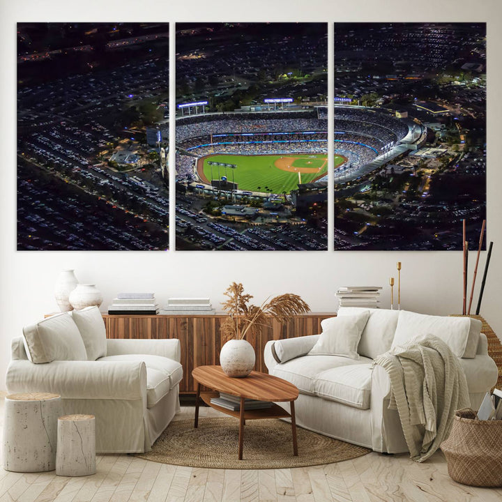 A large Los Angeles Dodgers print of Dodger Stadium at night is displayed near a window.