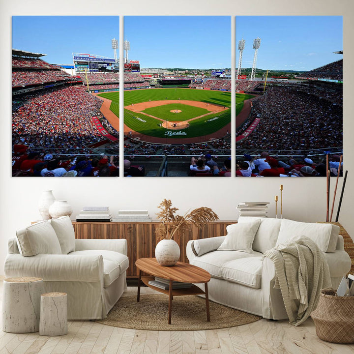 The Cincinnati Reds Baseball Team print of Great American Ball Park Stadium adorns the wall.