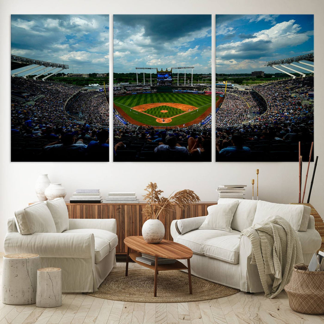 A 3-panel print of Kauffman Stadium, showcasing a crowded baseball field under cloudy skies.