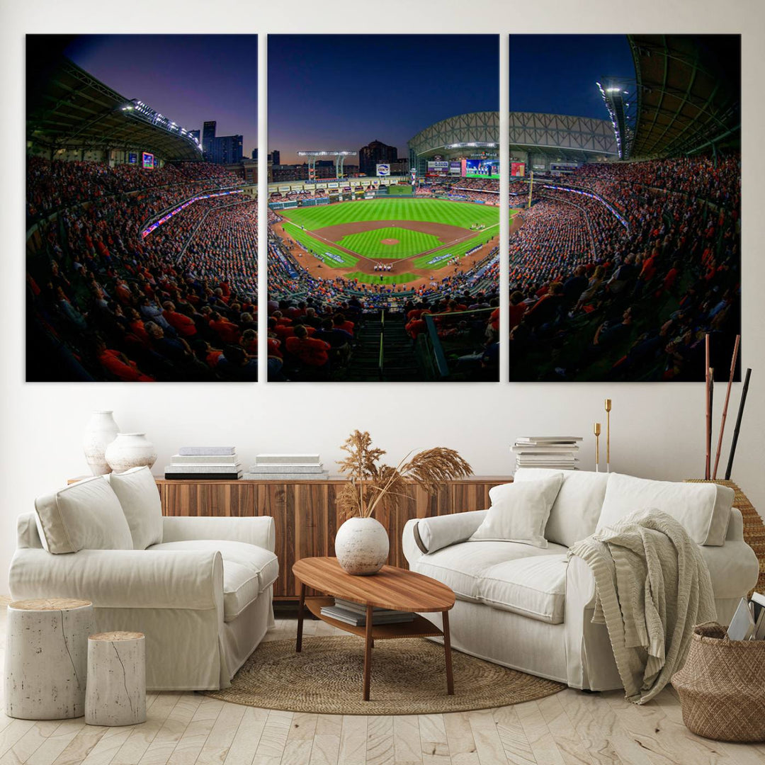 A canvas print of Houston Minute Maid Park at dusk is mounted on the wall.