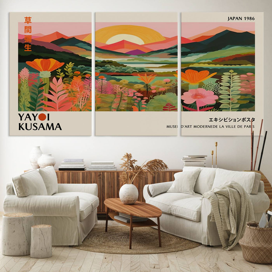 The Yayoi Kusama Landscape Canvas Print, featuring vibrant floral mountains and sunset scenery, enhances the room.